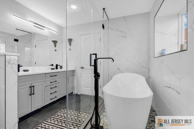 43 Meadow Run Road Bordentown, NJ 08505 - Photo 41 of 52 a spacious bathroom with a double vanity sink a mirror and a shower