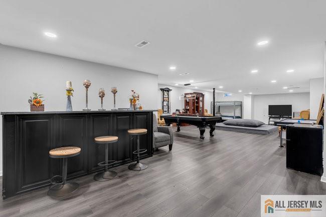 43 Meadow Run Road Bordentown, NJ 08505 - Photo 44 of 52 a living room with stainless steel appliances kitchen island granite countertop furniture and a dining table with wooden floor