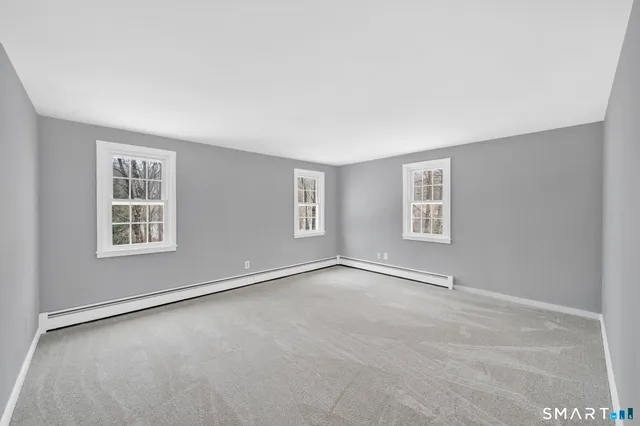 an empty room with windows