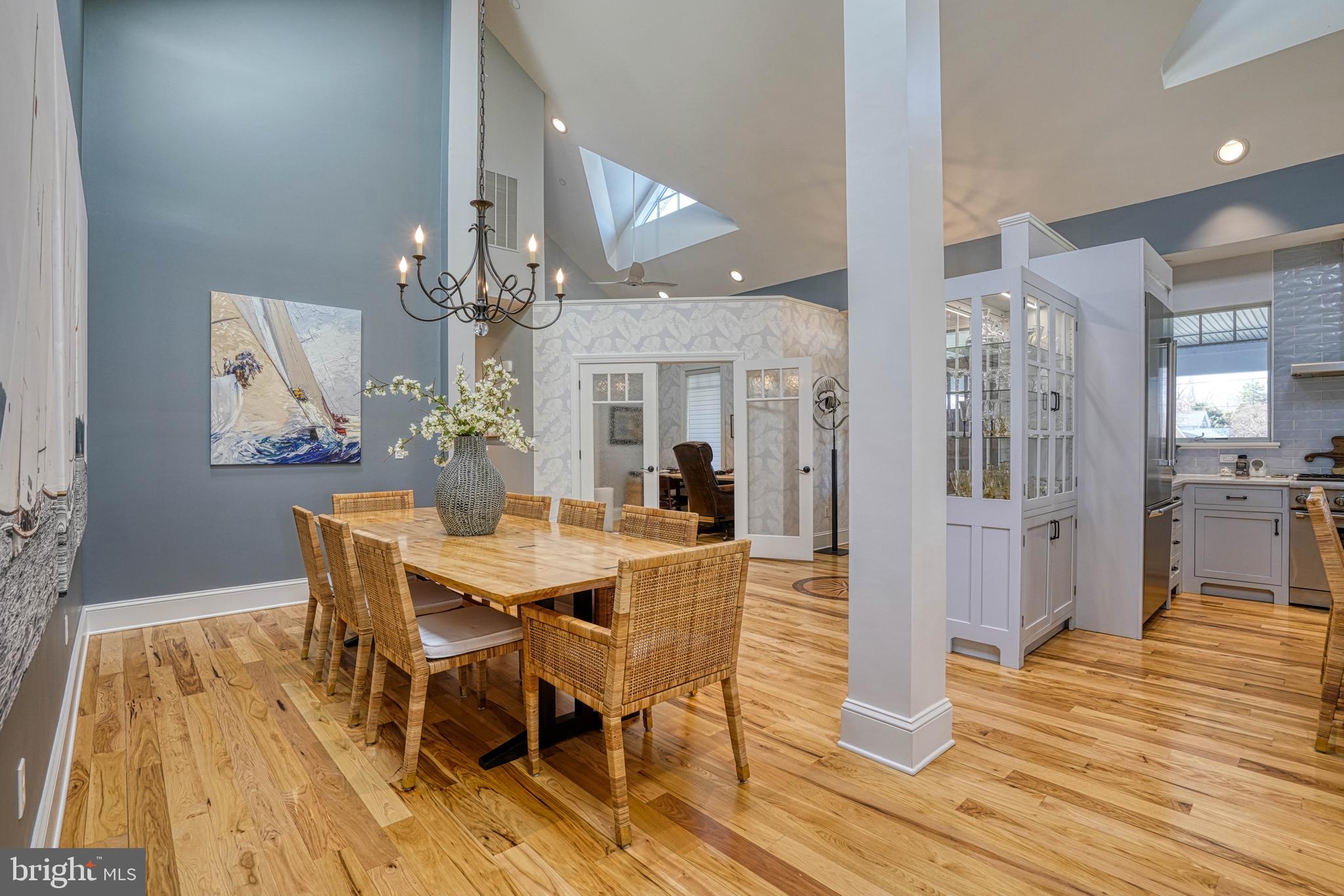 303 Manor Street St. Michaels, MD 21663 - Photo 28 of 100 a view of a dining room with furniture and wooden floor