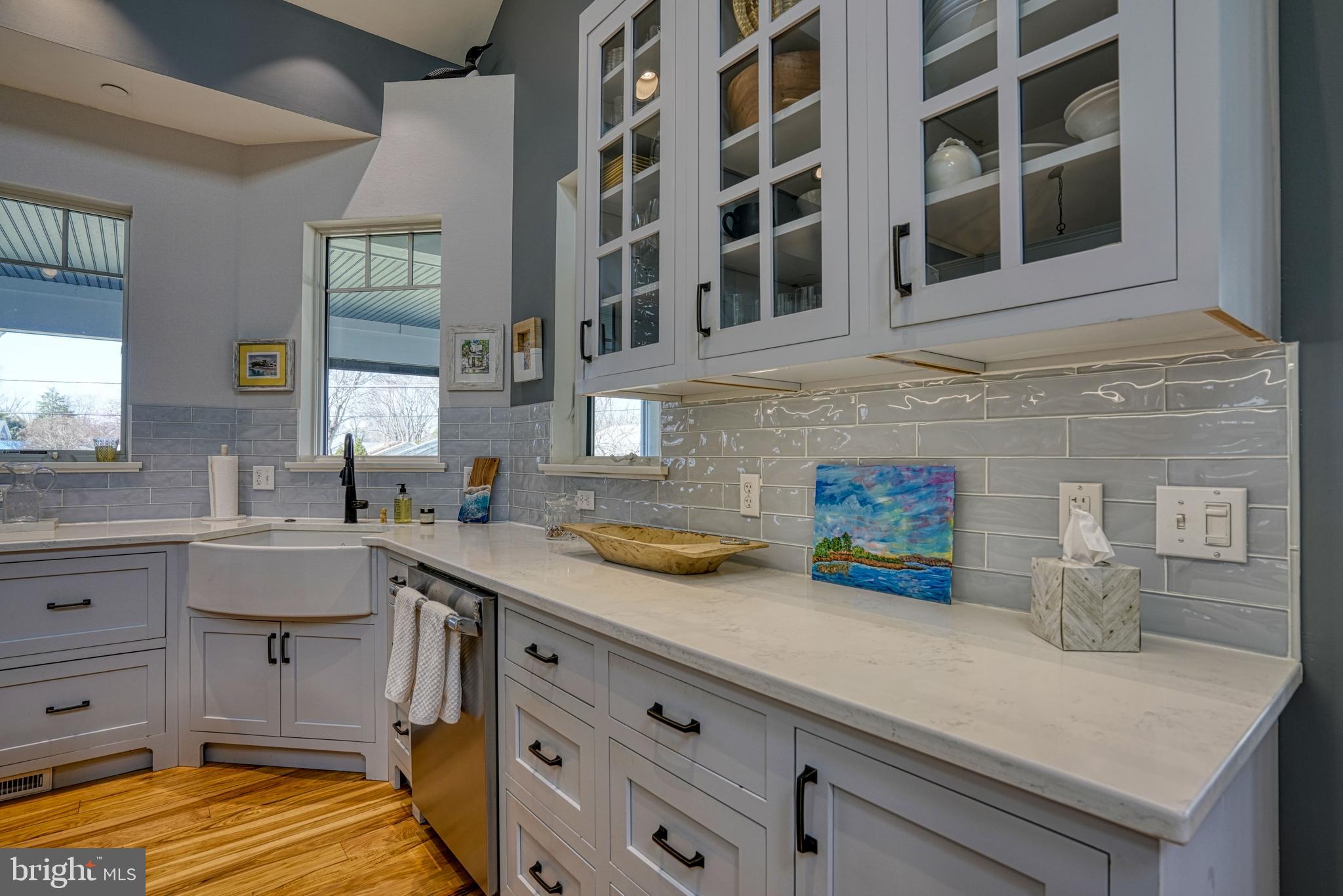 303 Manor Street St. Michaels, MD 21663 - Photo 38 of 100 a kitchen with a sink and cabinets