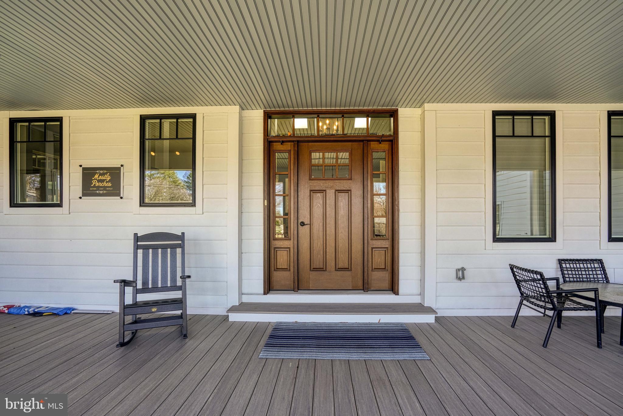 303 Manor Street St. Michaels, MD 21663 - Photo 4 of 100 a view of a livingroom with furniture and staircase