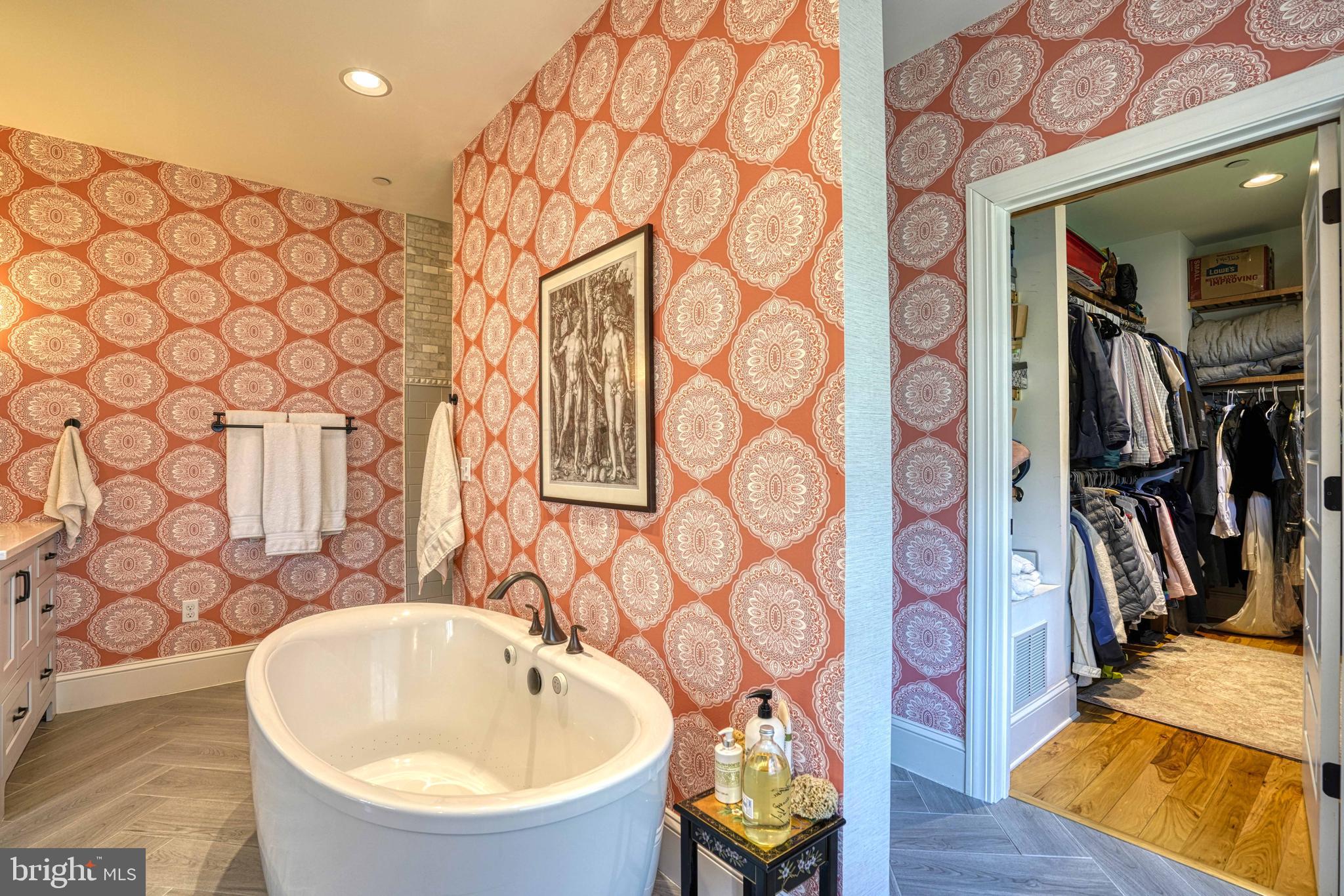 303 Manor Street St. Michaels, MD 21663 - Photo 55 of 100 a bathroom with a bathtub and a shower curtain