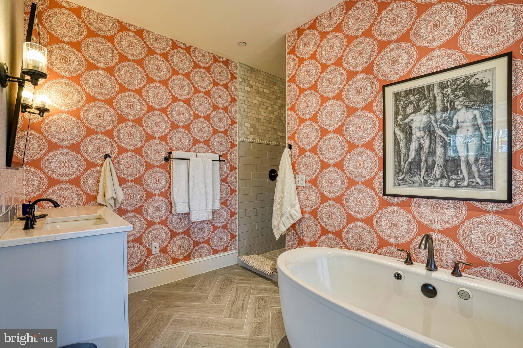 303 Manor Street St. Michaels, MD 21663 - Photo 56 of 100 a bathroom with a sink and a tub