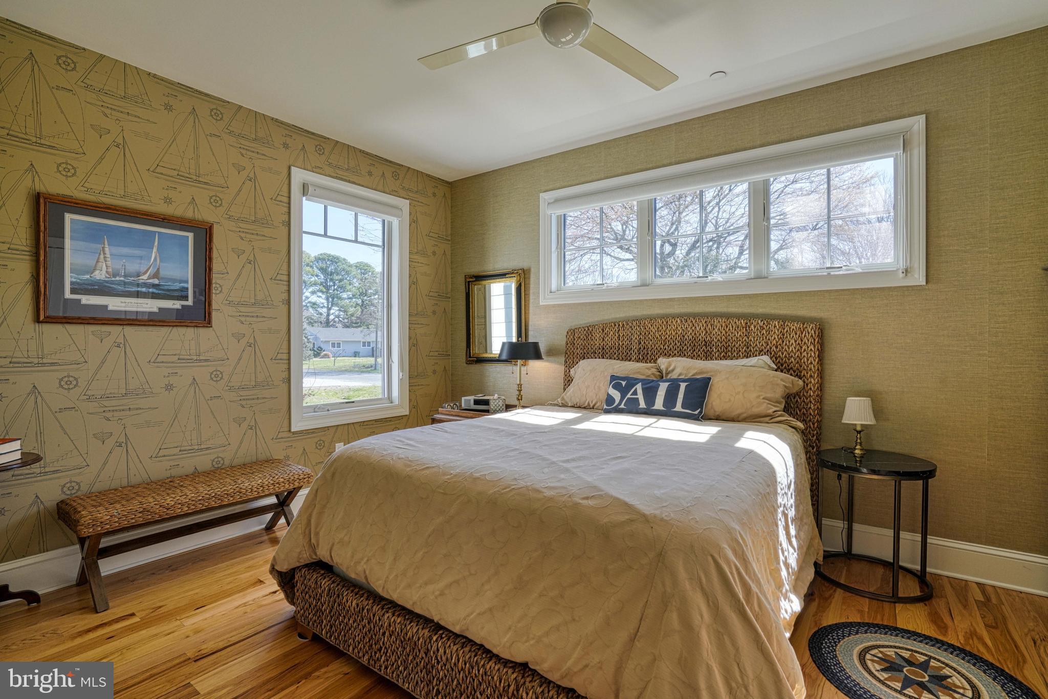 303 Manor Street St. Michaels, MD 21663 - Photo 58 of 100 a bedroom with a bed and a window