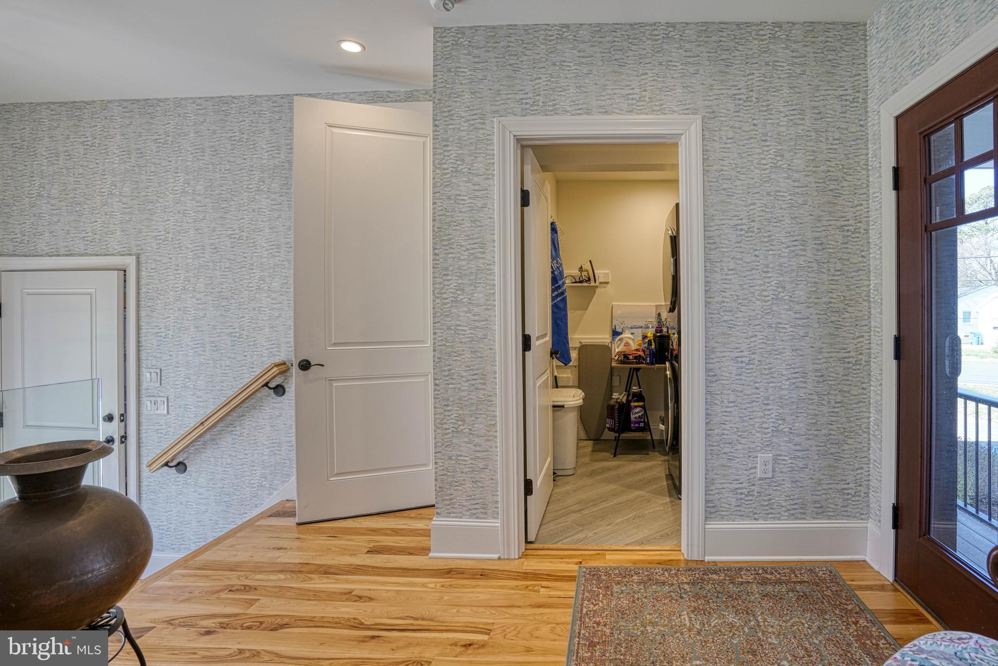 303 Manor Street St. Michaels, MD 21663 - Photo 67 of 100 a view of a bedroom with wooden floor and bedroom