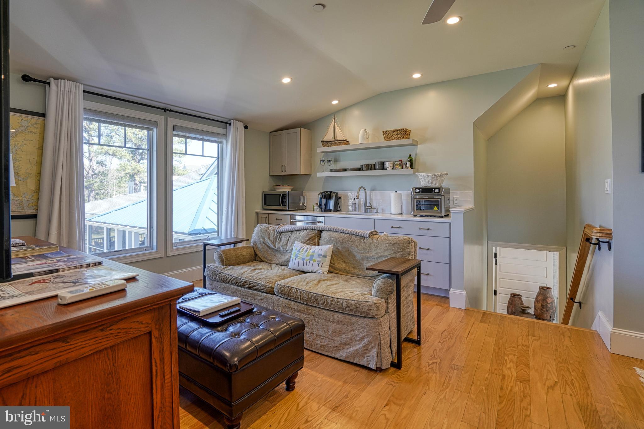 303 Manor Street St. Michaels, MD 21663 - Photo 71 of 100 a living room with furniture and a large window