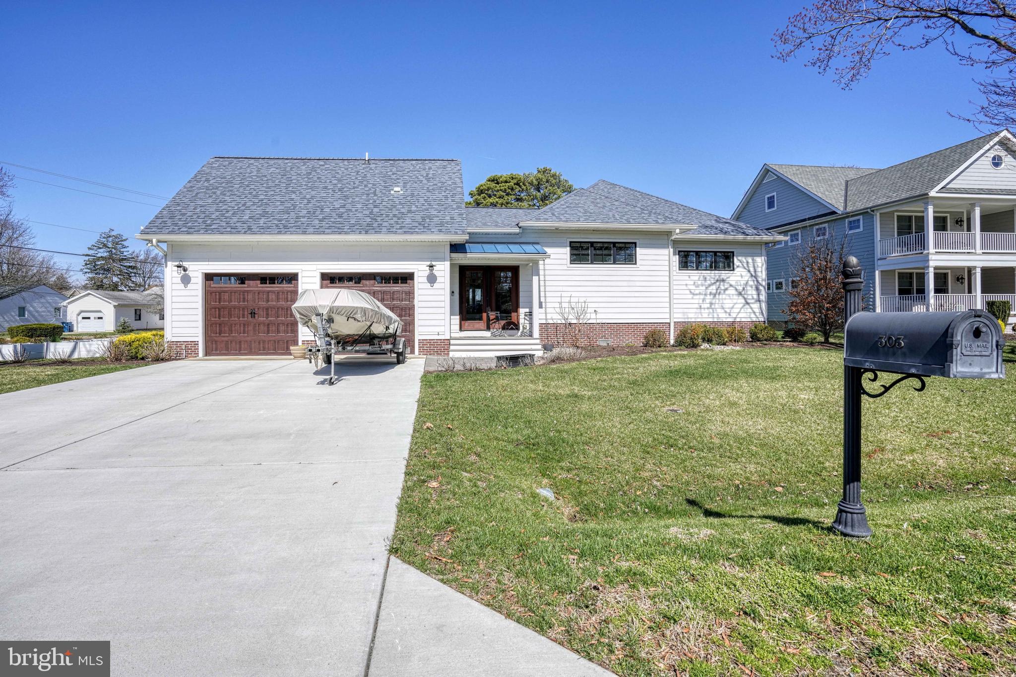 303 Manor Street St. Michaels, MD 21663 - Photo 91 of 100 a view of a house with a yard