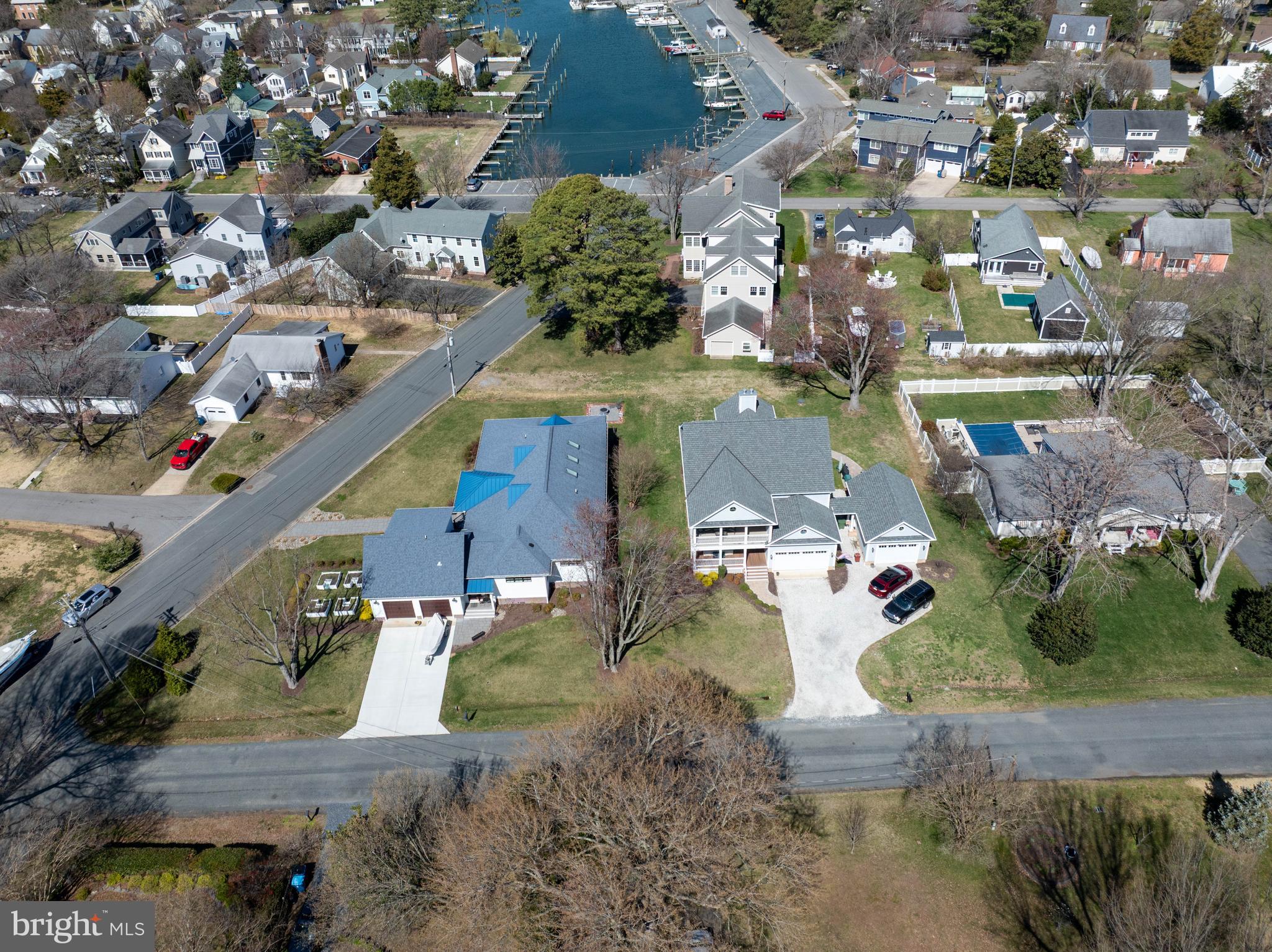 303 Manor Street St. Michaels, MD 21663 - Photo 97 of 100 an aerial view of a house with a lake view