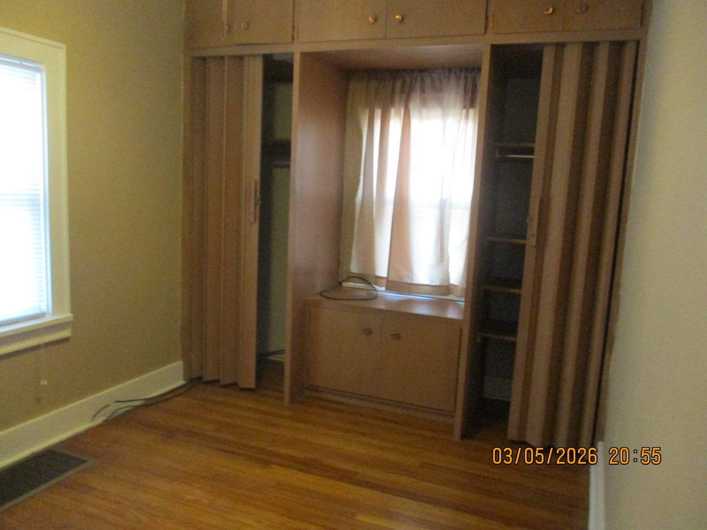 1412 13th Street Moline, IL 61265 - Photo 22 of 31 an empty room with wooden floor and windows