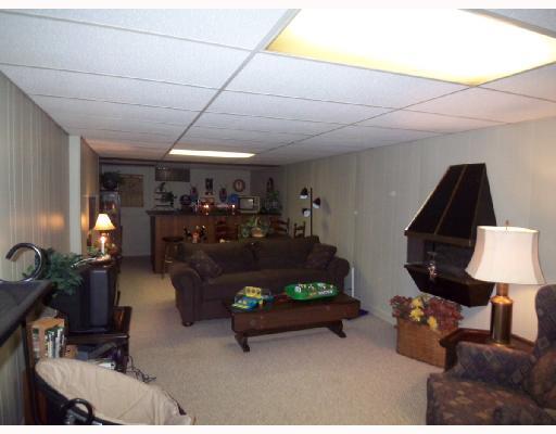 2847 Ivanhoe Road Sharpsville, PA 16150 - Photo 8 of 13 Den/Family/Great Room. 12x28 basement family room with bar and electric fireplace. Plenty of room to entertain, great space for a large screen TV, exercise equipment, etc. Basement also has lots of storage area, laundry and shower.