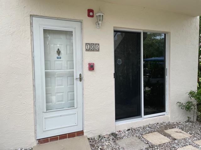 280 Northwest 67th Street, Unit 108 Boca Raton, FL 33487 - Photo 4 of 32 Front