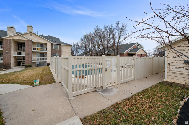 2095 South Main Street, Unit 13 Bountiful, UT 84010 - Photo 27 of 45 Gate with a community pool