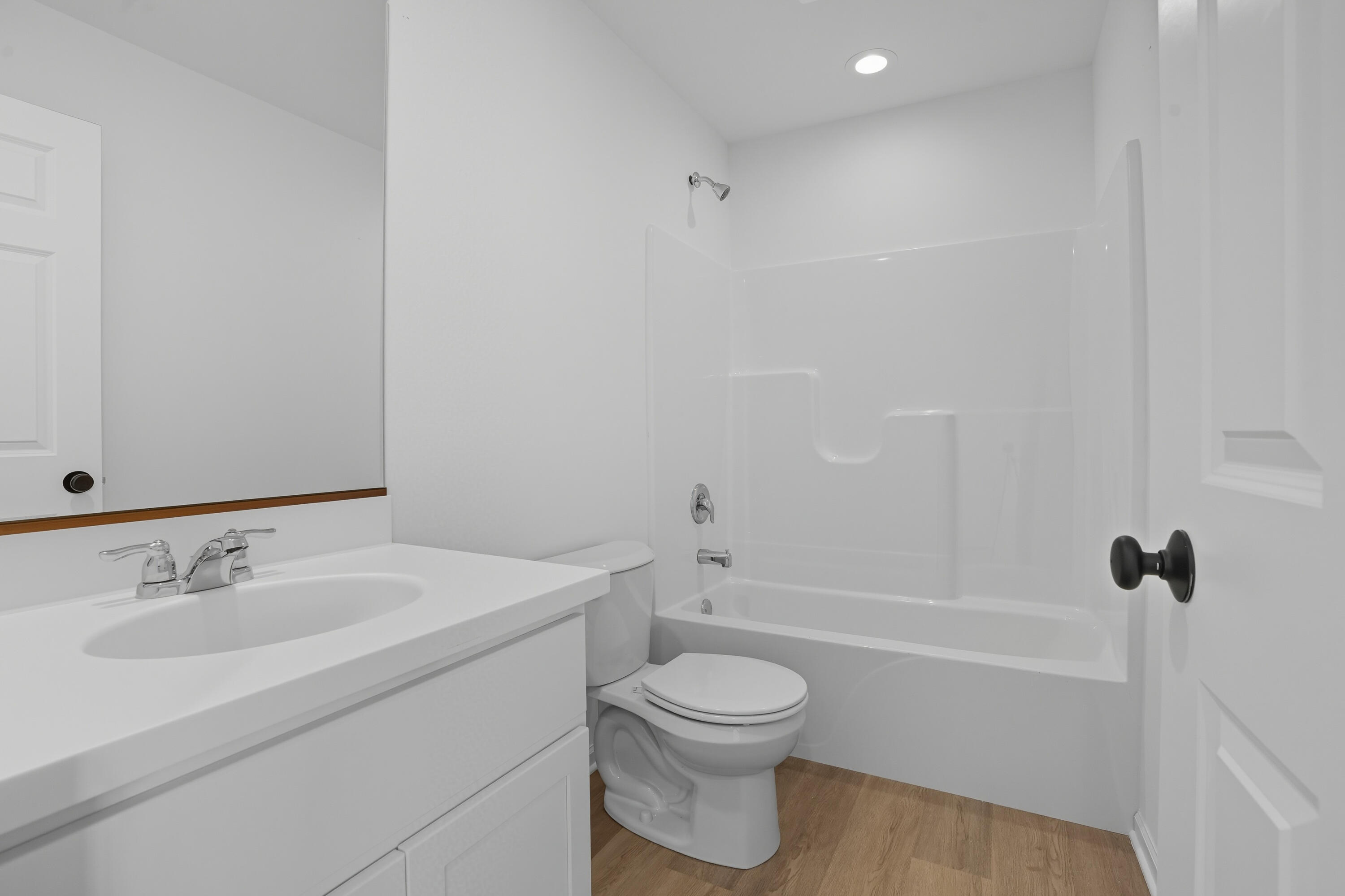 5800 Buck Lane Portage, IN 46368 - Photo 11 of 22 a bathroom with a sink toilet and shower