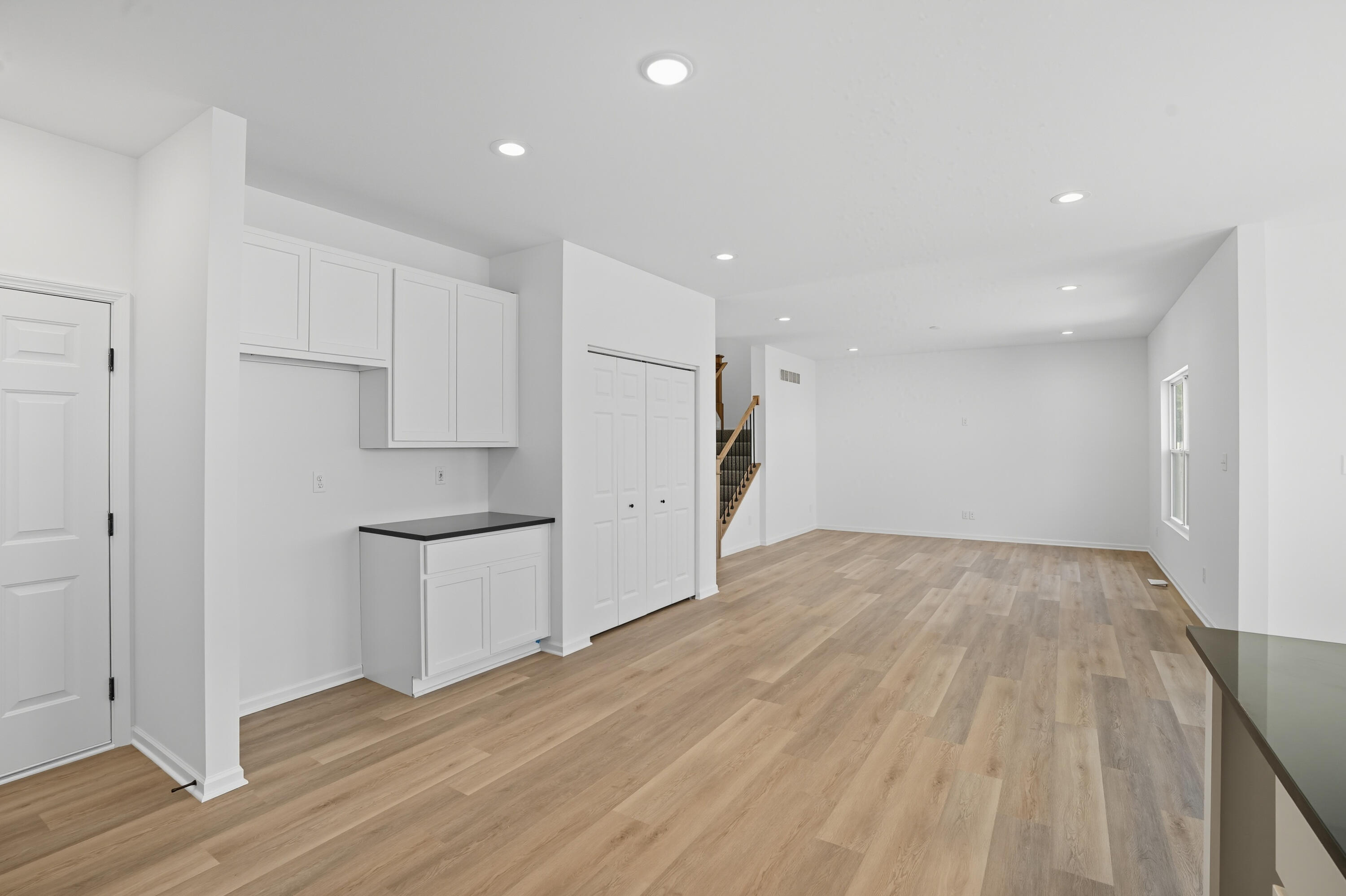 5800 Buck Lane Portage, IN 46368 - Photo 8 of 22 a view of a kitchen with a sink and a refrigerator