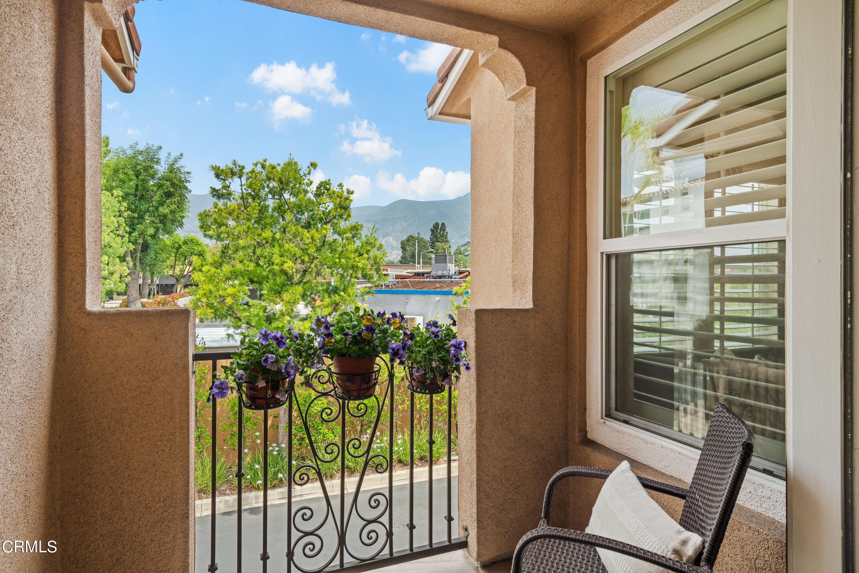 453 North Altadena Drive, Unit 5 Pasadena, CA 91107 - Photo 14 of 36 a balcony with couple of chairs and a potted plant