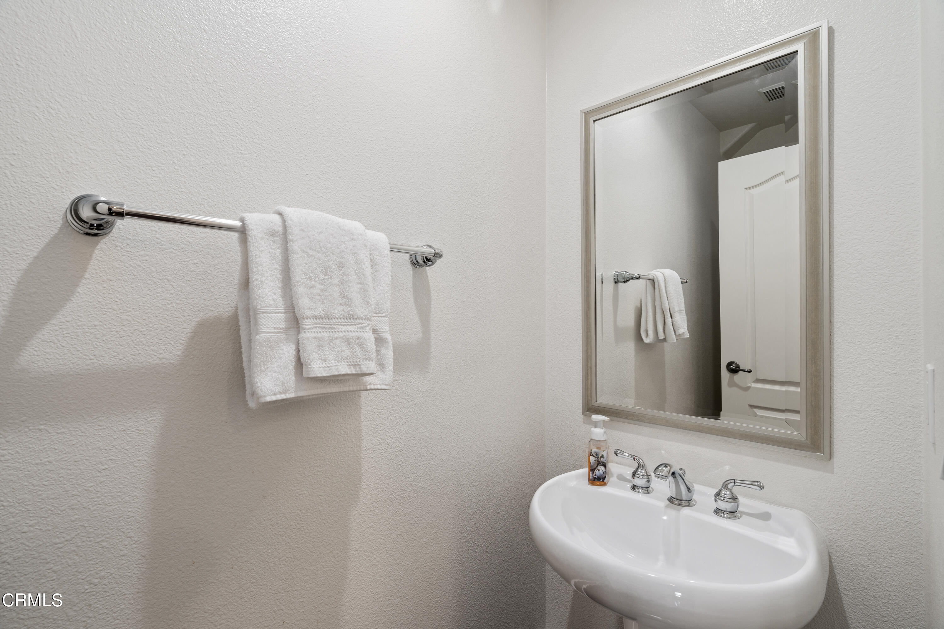 453 North Altadena Drive, Unit 5 Pasadena, CA 91107 - Photo 21 of 36 a bathroom with a sink a mirror and shower