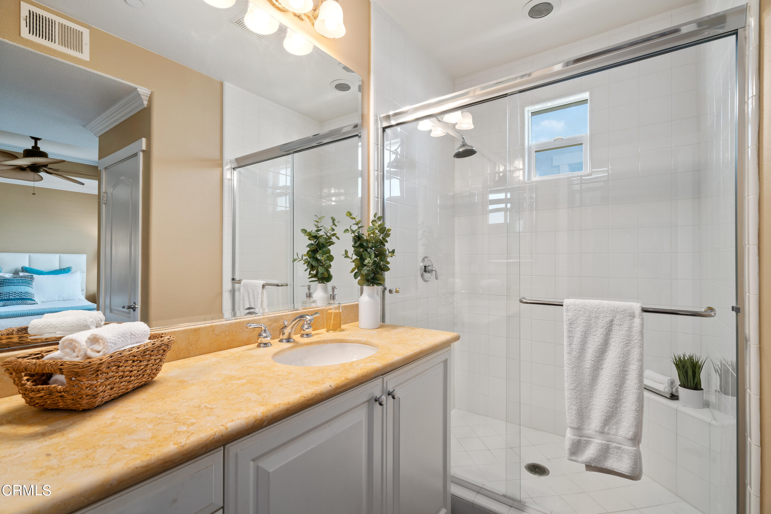453 North Altadena Drive, Unit 5 Pasadena, CA 91107 - Photo 28 of 36 a bathroom with a granite countertop sink a mirror and shower
