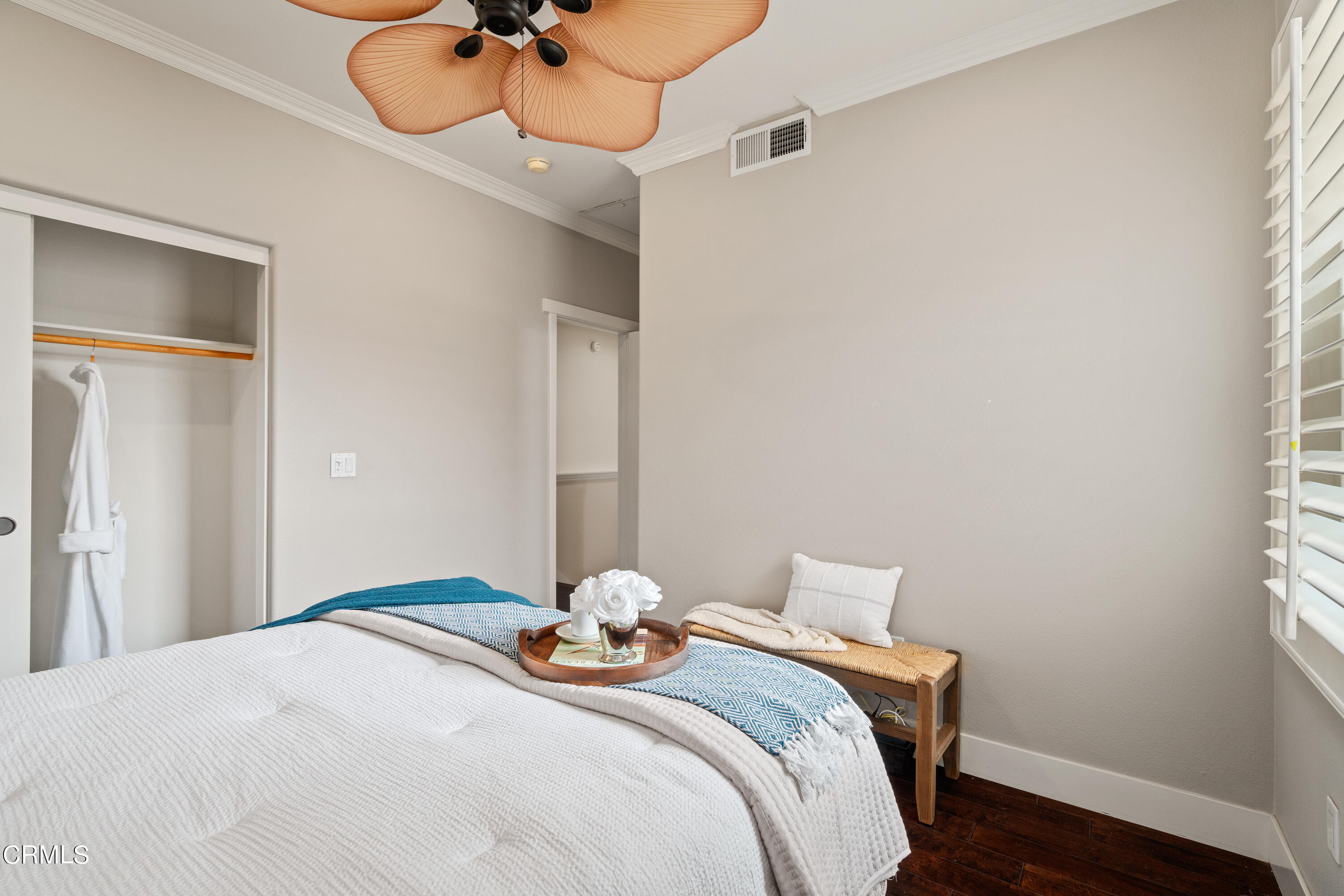 453 North Altadena Drive, Unit 5 Pasadena, CA 91107 - Photo 31 of 36 a bedroom with a bed and a chandelier