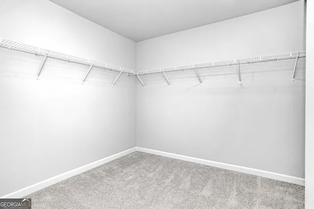 a view of a room with racks on the wall