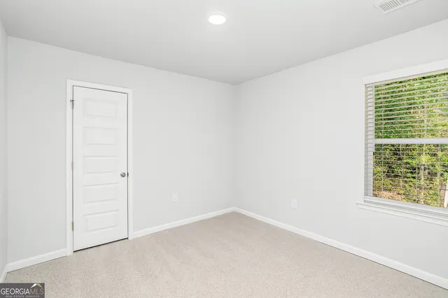 an empty room with a window