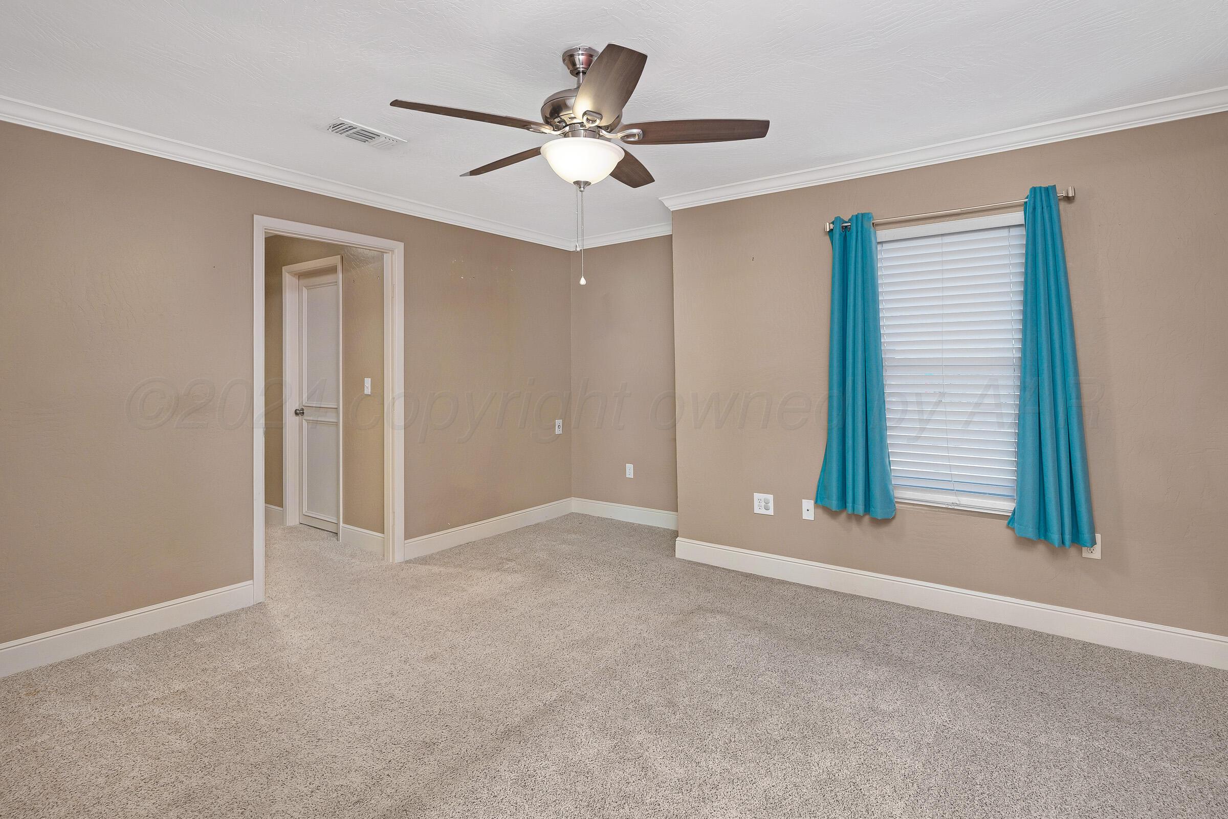 201 Rio Trail Amarillo, TX 79108 - Photo 12 of 31 012_West Primary Bedroom