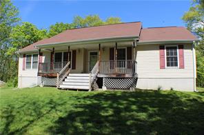 Welcome Home! This four bedroom ranch has two full baths. Beautiful hardwood floors. Situated on just over 10 acres. Come take a look for yourself. Clean and move in ready interior.