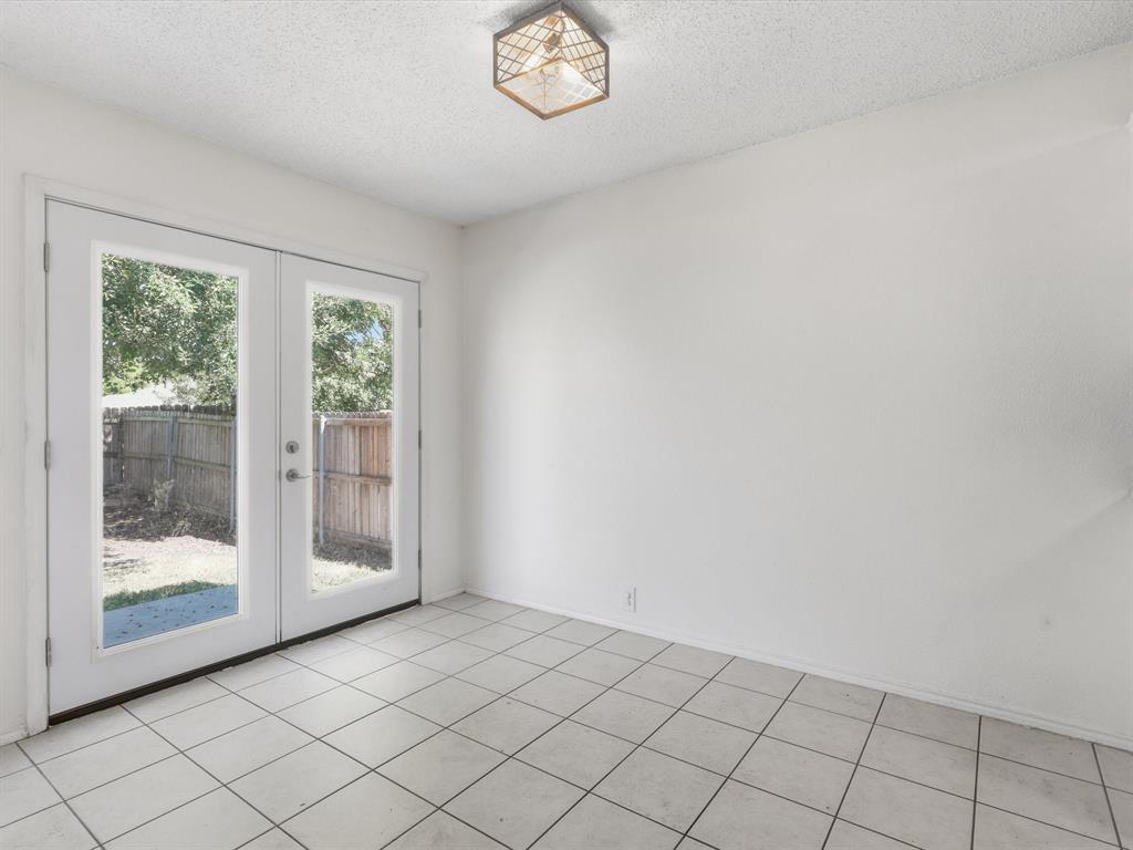 4305 Falcon Drive Sherman, TX 75092 - Photo 23 of 27 a view of an empty room and window