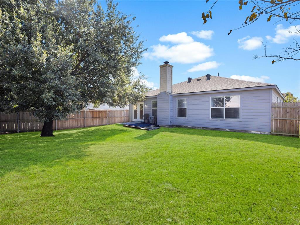 4305 Falcon Drive Sherman, TX 75092 - Photo 26 of 27 a view of a house with a backyard