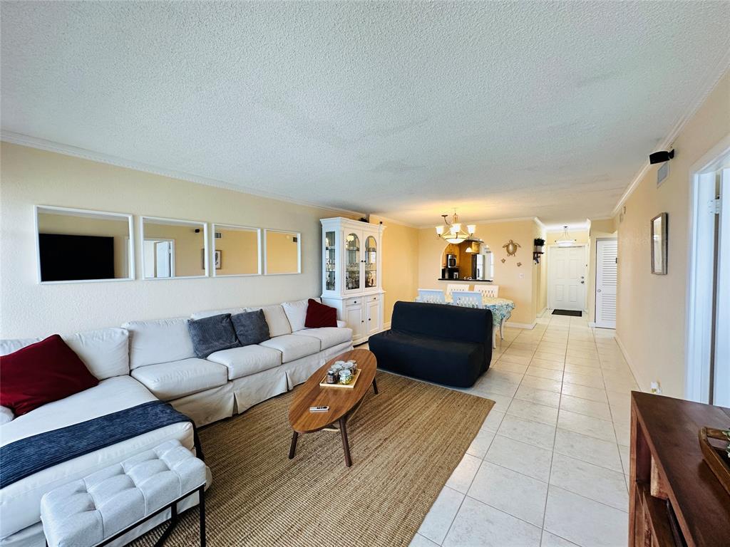 750 North Ocean Boulevard, Unit 2008 Pompano Beach, FL 33062 - Photo 12 of 64 a living room with furniture and a couch