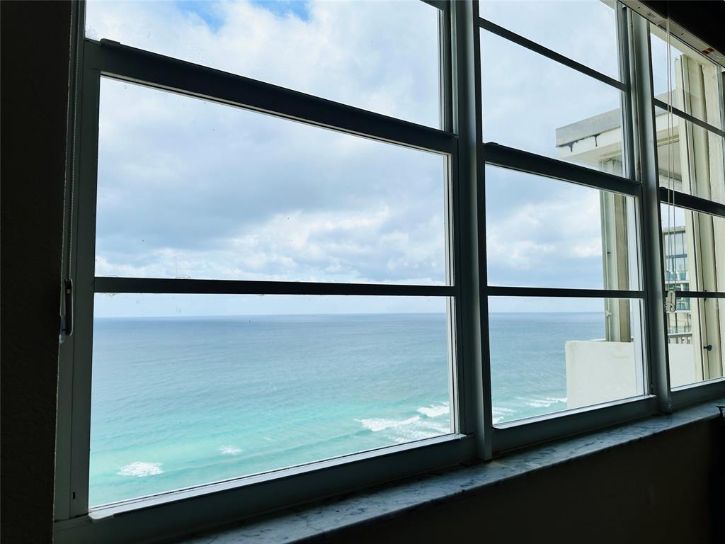 750 North Ocean Boulevard, Unit 2008 Pompano Beach, FL 33062 - Photo 20 of 64 a view of a glass door with a glass door