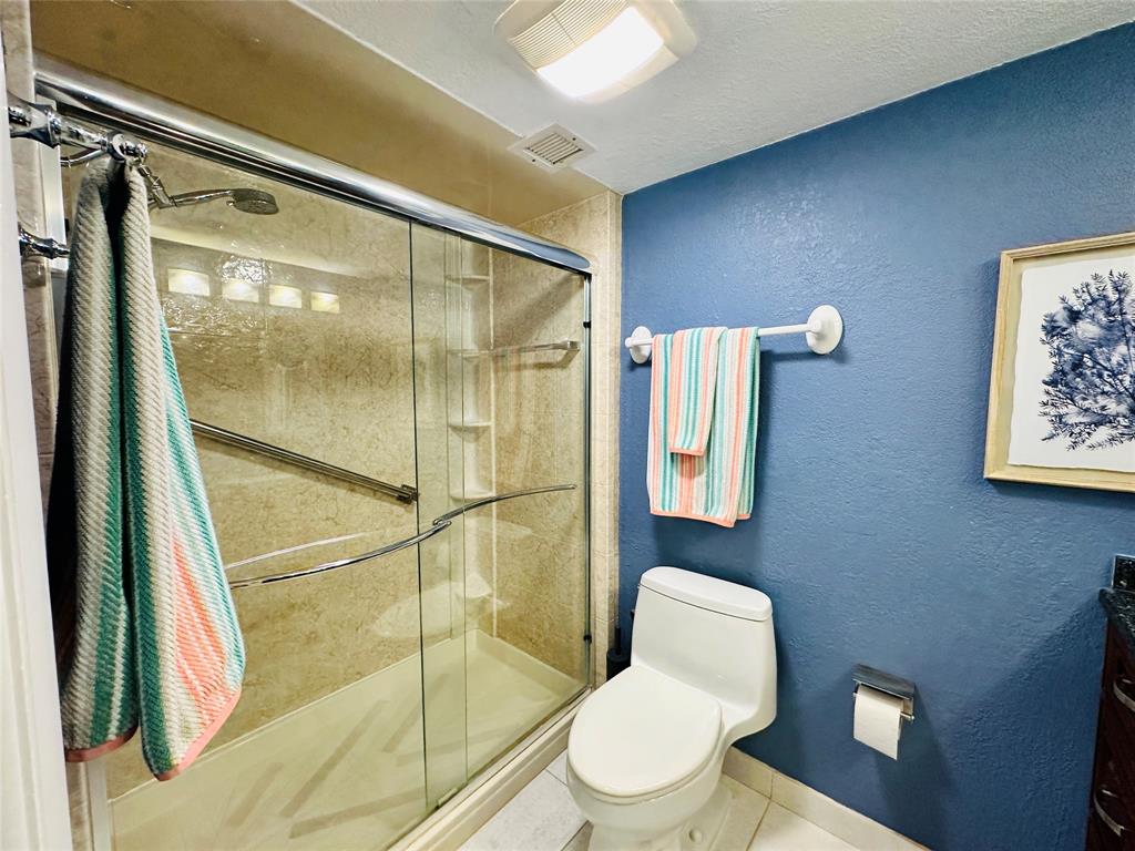 750 North Ocean Boulevard, Unit 2008 Pompano Beach, FL 33062 - Photo 26 of 64 a bathroom with a toilet and a shower