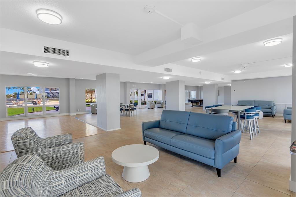 750 North Ocean Boulevard, Unit 2008 Pompano Beach, FL 33062 - Photo 37 of 64 a living room with furniture and a view of kitchen