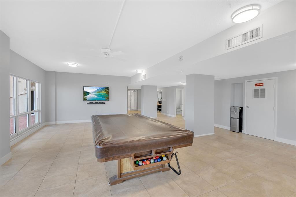 750 North Ocean Boulevard, Unit 2008 Pompano Beach, FL 33062 - Photo 39 of 64 a view of a room with gym equipment