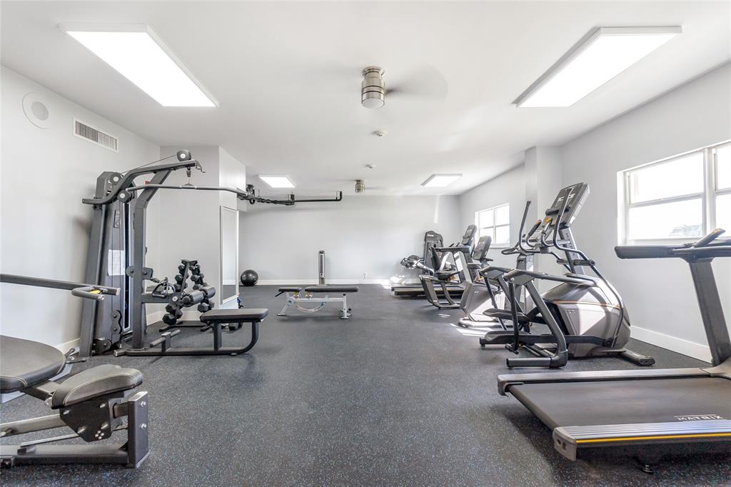 750 North Ocean Boulevard, Unit 2008 Pompano Beach, FL 33062 - Photo 41 of 64 a view of a room with gym equipment