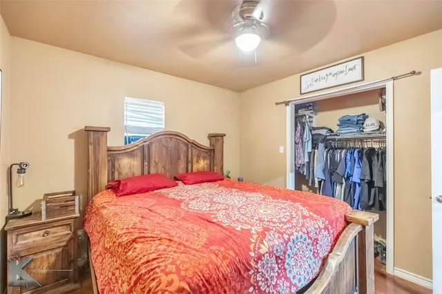 a view of a studio with wooden floor