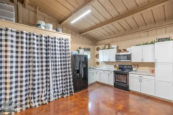 a view of a livingroom with wooden floor
