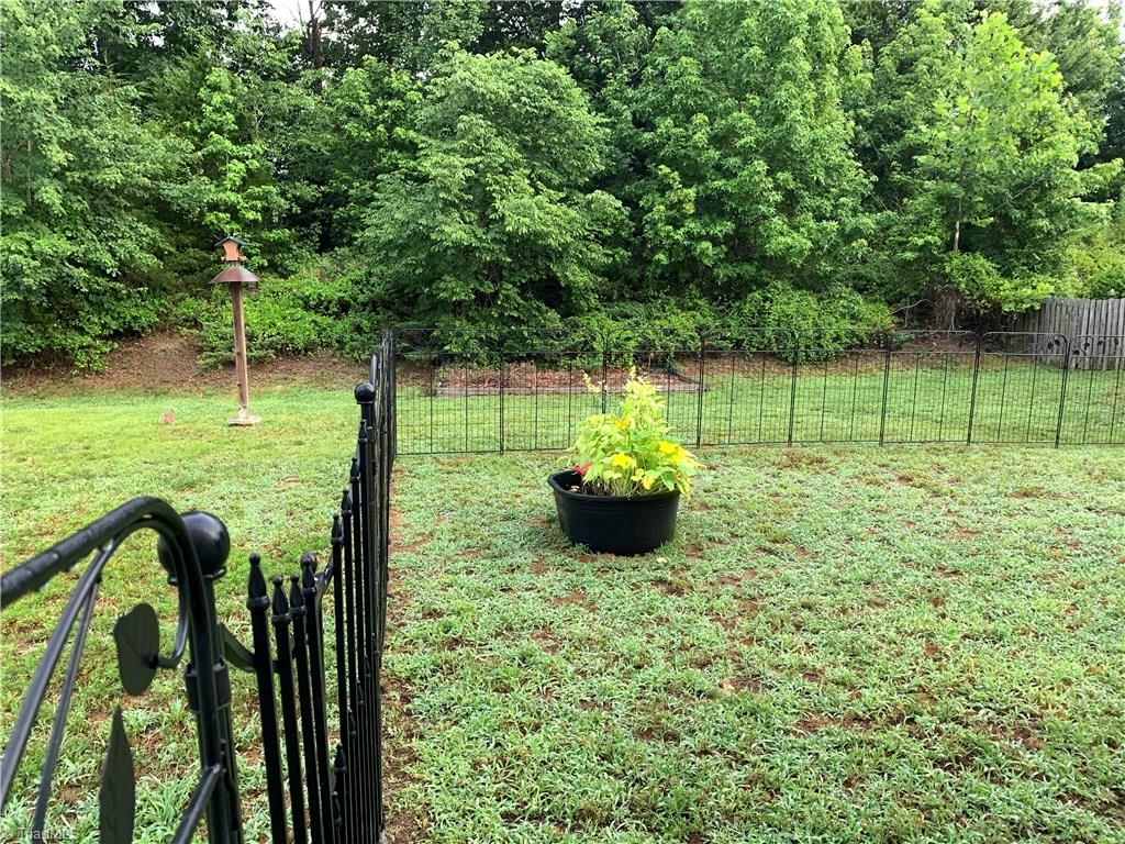 1124 Wesson Court High Point, NC 27265 - Photo 28 of 30 Backyard with decorative fencing, and so much privacy!