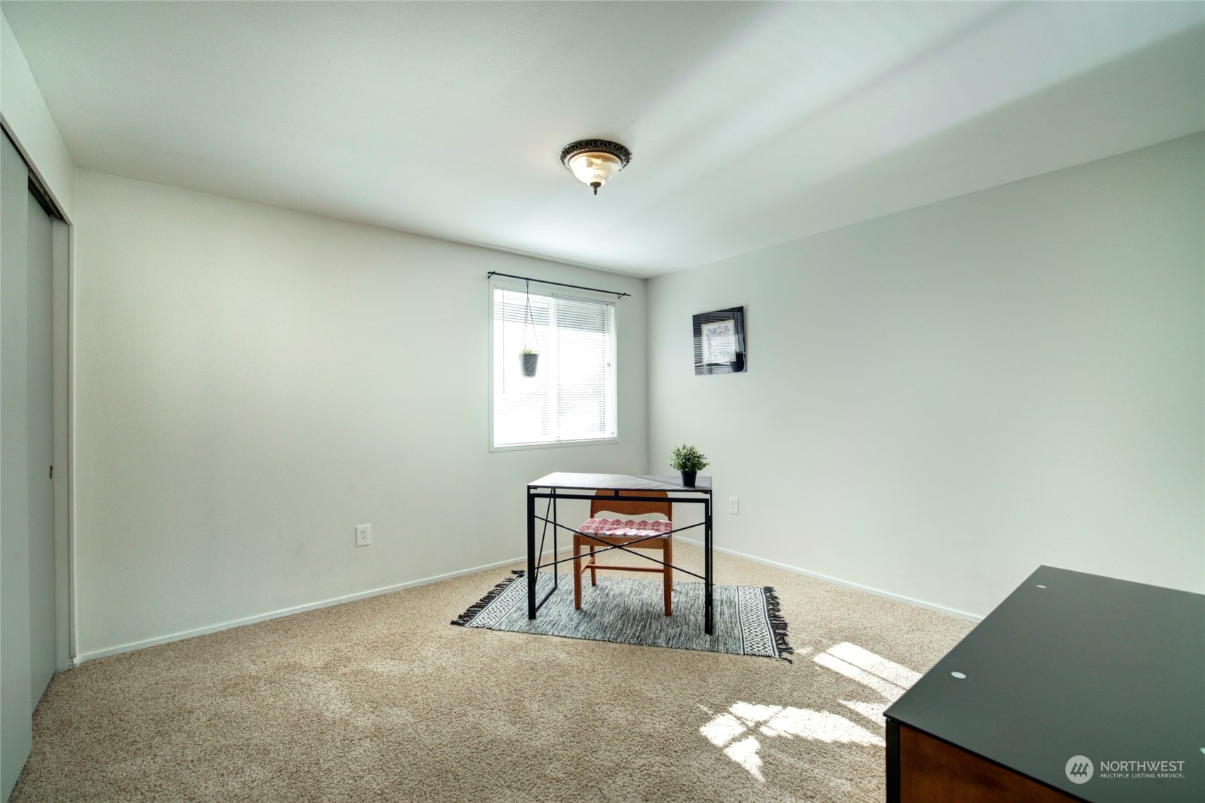 22906 Edmonds Way, Unit 15 Edmonds, WA 98020 - Photo 18 of 22 a workspace with furniture and window