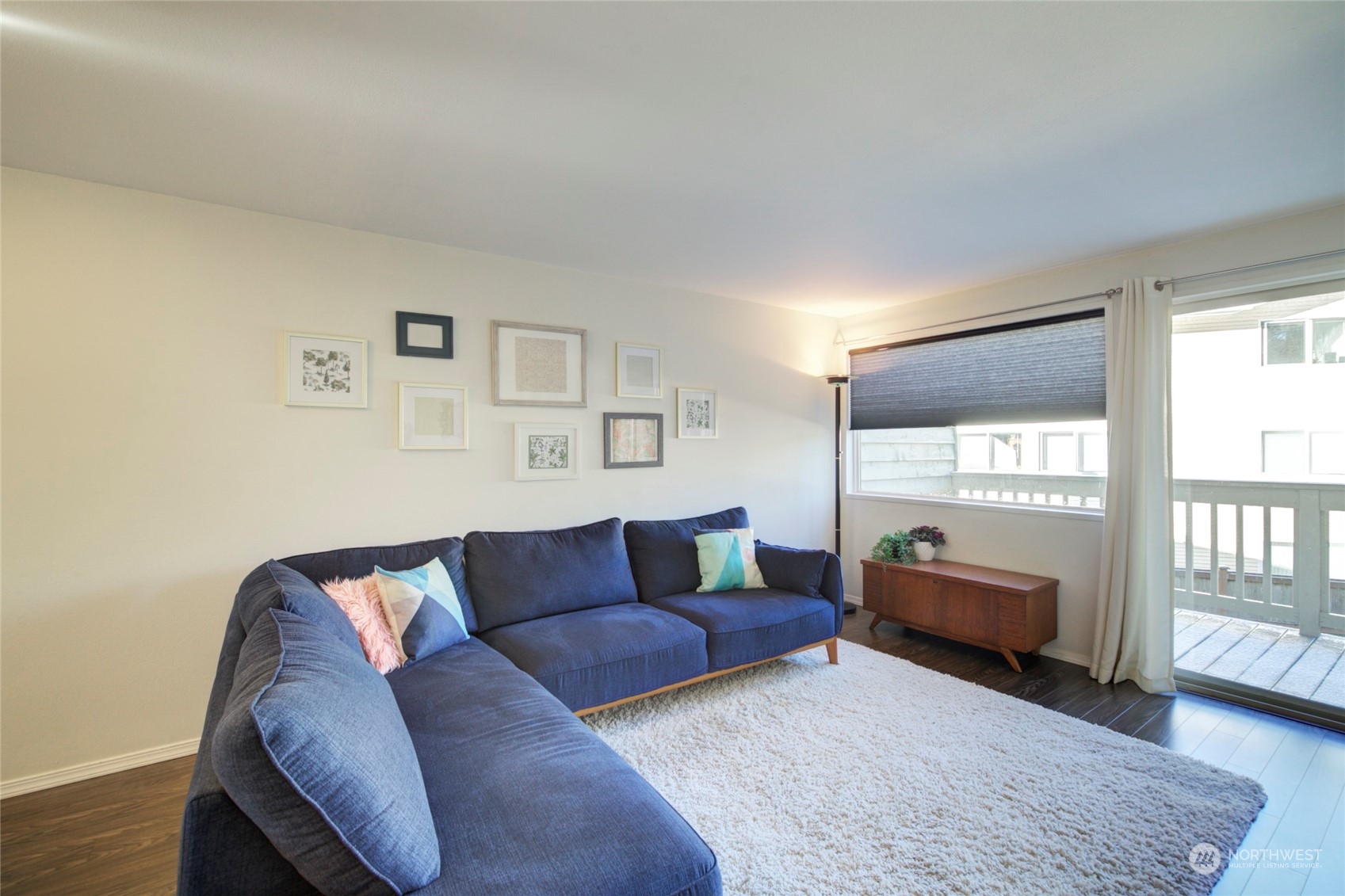 22906 Edmonds Way, Unit 15 Edmonds, WA 98020 - Photo 7 of 22 a living room with furniture and a window