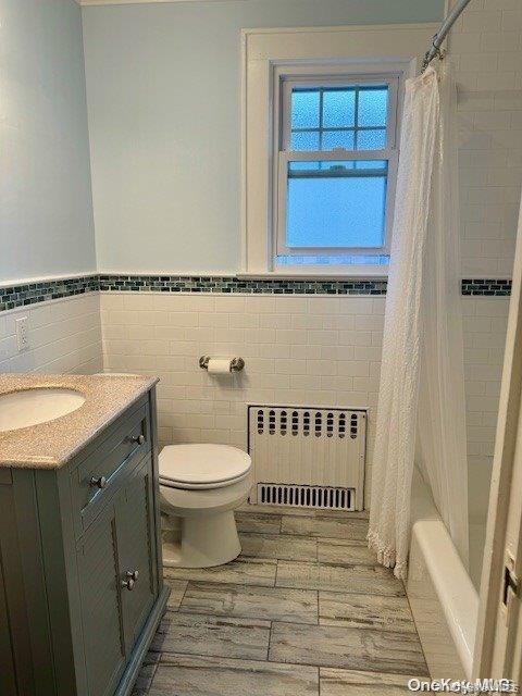 11 Valley Road Bayville, NY 11709 - Photo 13 of 20 a bathroom with a granite countertop sink a toilet and a shower