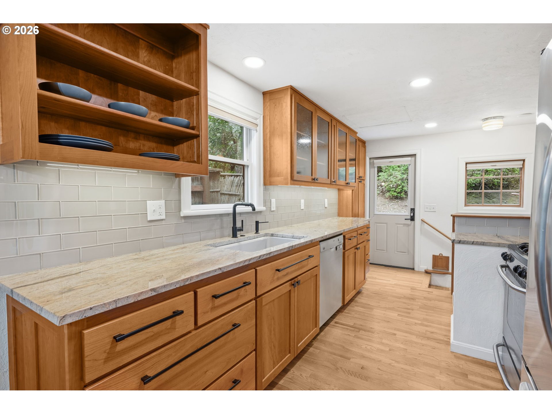 1841 Fairmount Boulevard Eugene, OR 97403 - Photo 14 of 44 a kitchen with a stove a sink and a refrigerator
