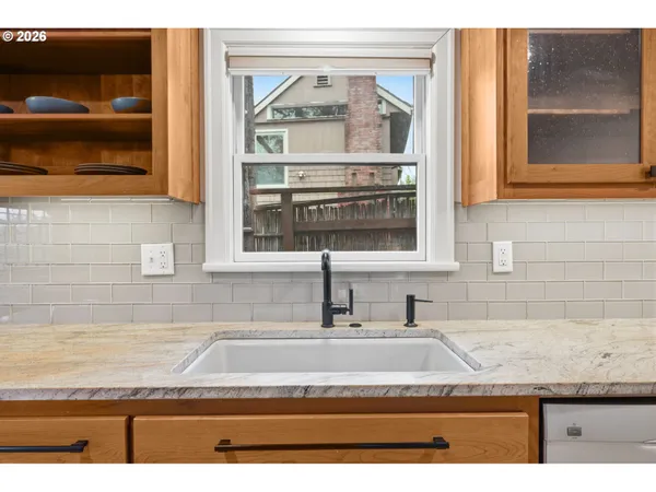 a view of a sink and a mirror