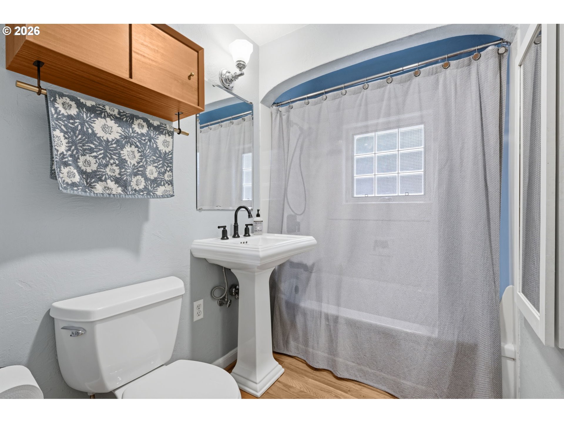 1841 Fairmount Boulevard Eugene, OR 97403 - Photo 22 of 44 a bathroom with a sink and mirror with toilet