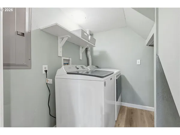 a utility room with dryer and washer