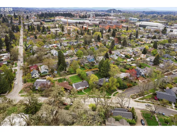 an aerial view of residential houses with outdoor space