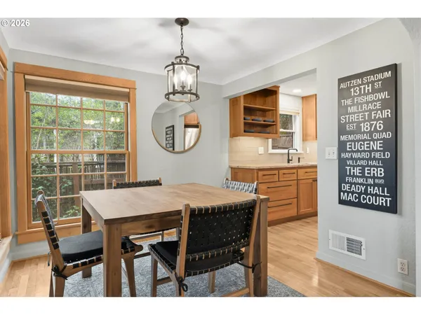a view of a dining room with furniture window and outside view