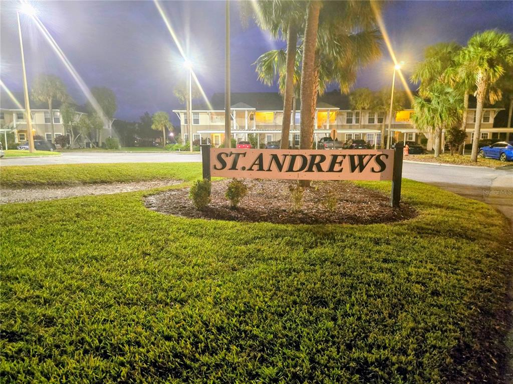 5943 Topher Trail, Unit 22 Mulberry, FL 33860 - Photo 1 of 15 a view of a street with large trees