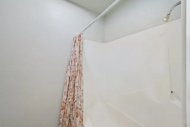 a view of a room with a window