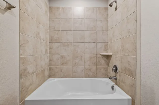 a bathroom with a bathtub